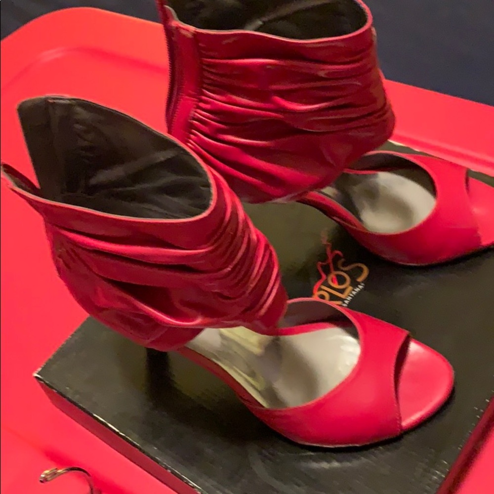 Carlos red heels
